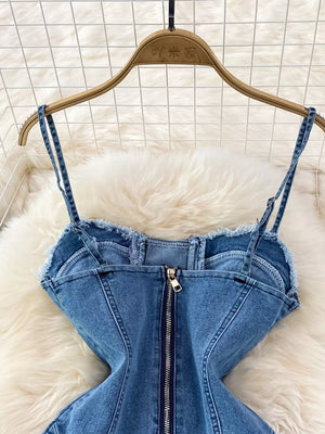 Blue denim corset dress with spaghetti straps and front zipper detail.