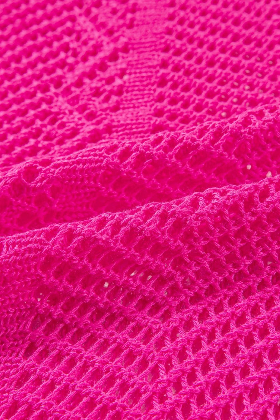 Open-knit chevron sleeve top in hot pink acrylic with a textured stitch pattern.