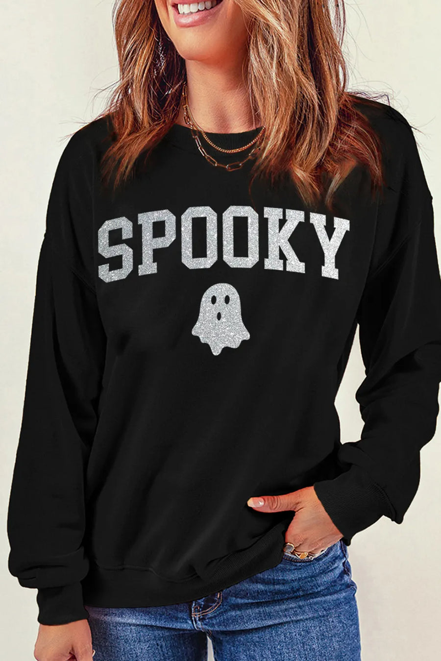 Black sweatshirt with glitter "Spooky" graphic and ghost detail