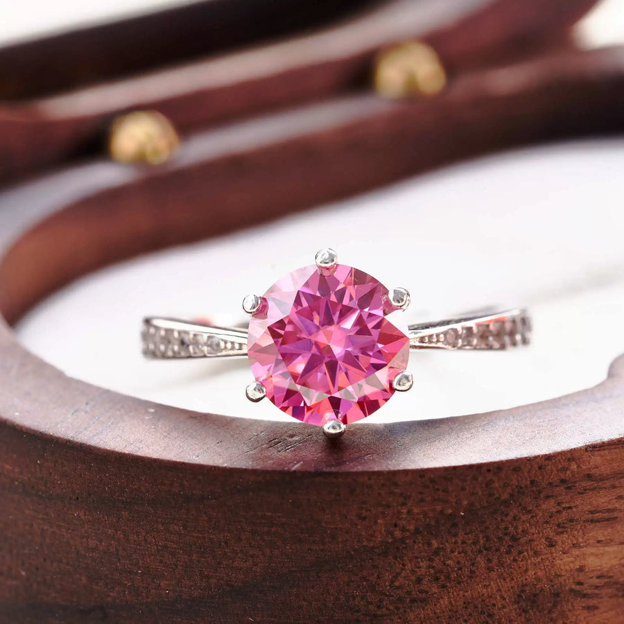 pink ring with prong setting and N/A