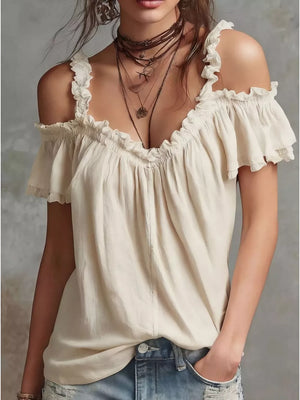 White ruffled cold shoulder shirt with deep V-neck and short sleeves.
