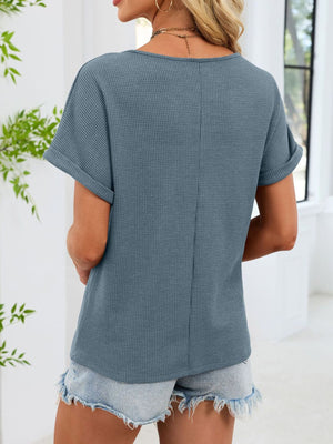 Blue waffle knit short sleeve tee with cuffed sleeves and a relaxed fit.