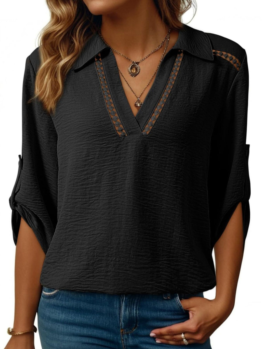 Black crinkled texture shirt with Johnny collar, V-neck, and decorative trim.