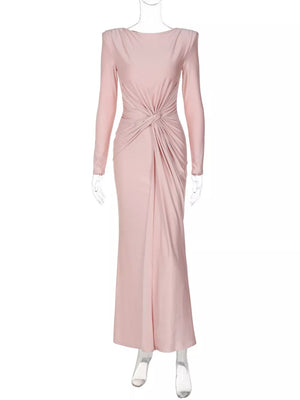 Pink ruched long sleeve maxi dress with boat neckline and knot detail