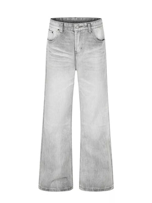 Men's gray vintage wash wide leg cotton jeans with a faded look.