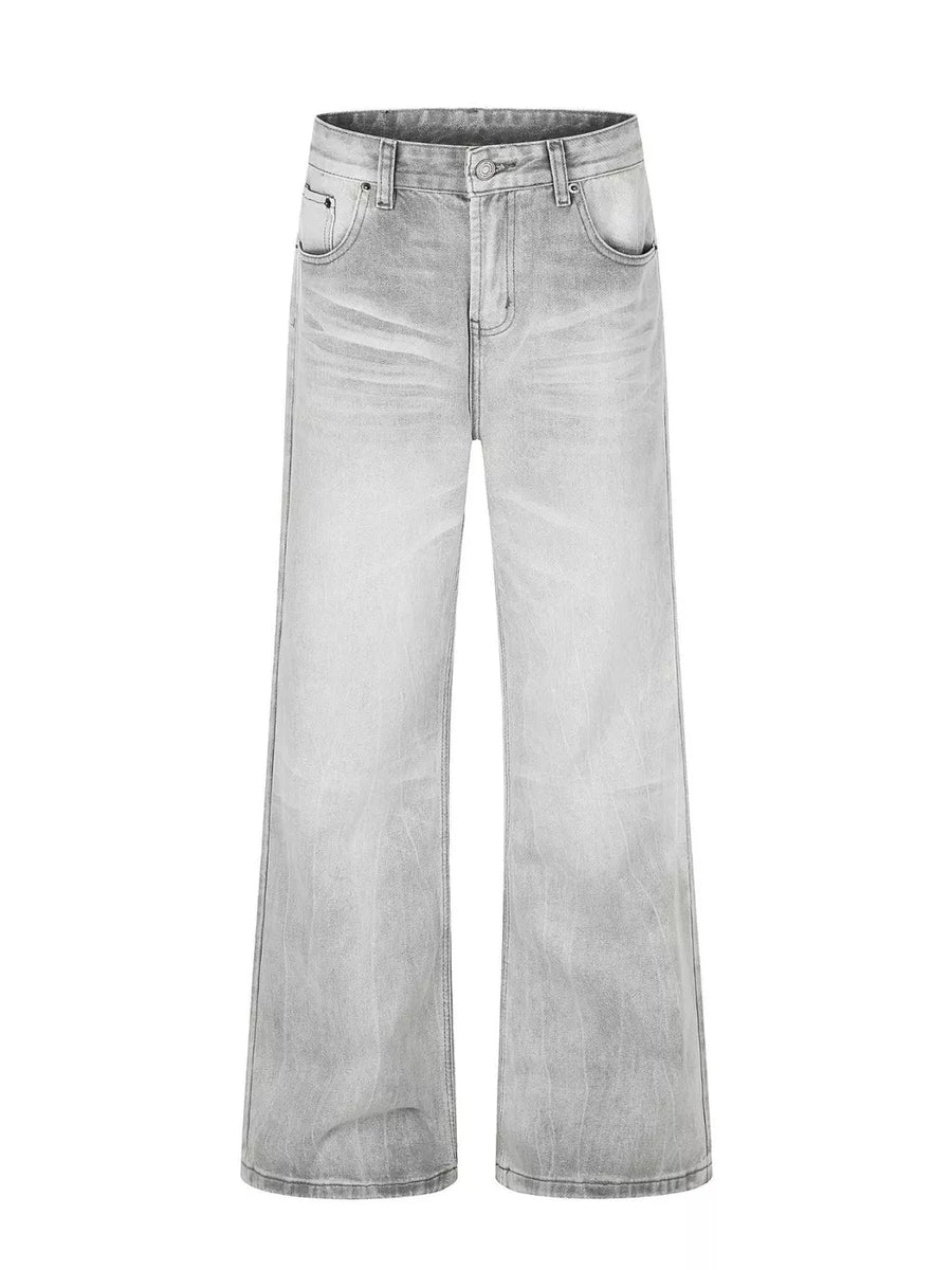 Men's gray vintage wash wide leg cotton jeans with a faded look.