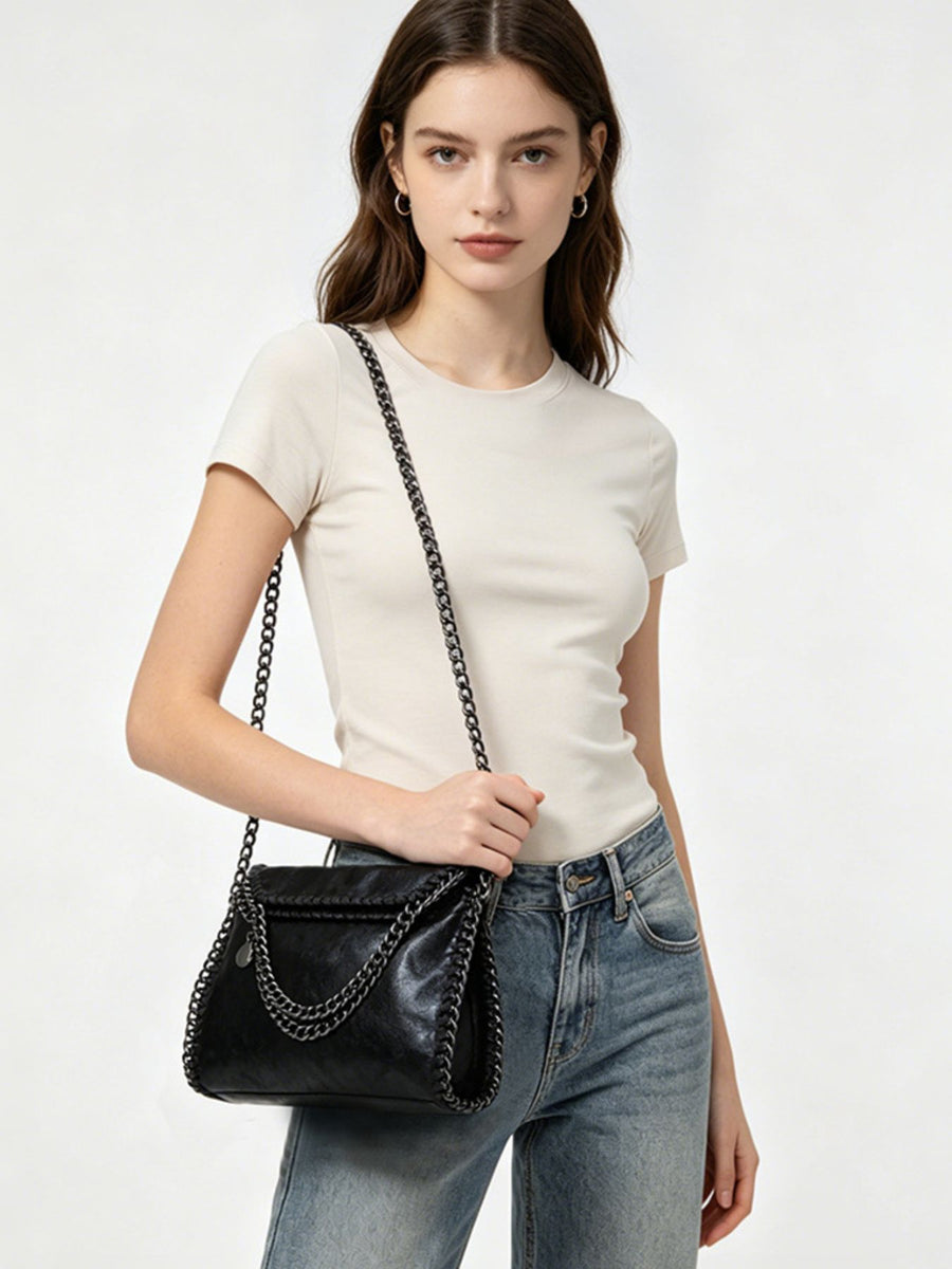 black crossbody bag with medium and magnetic snap