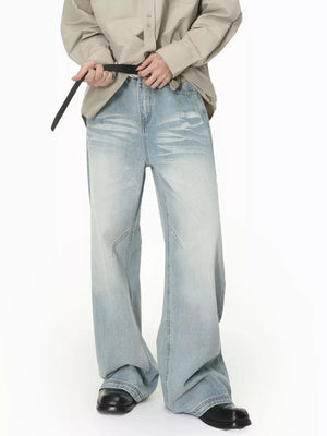 Classic wide-leg vintage wash jeans in light blue denim with a relaxed fit.