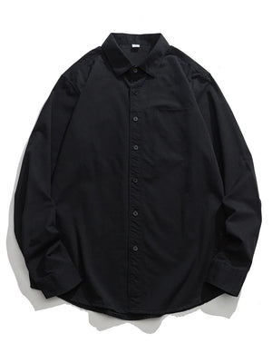 Black cotton button-down shirt with a chest pocket and long sleeves.