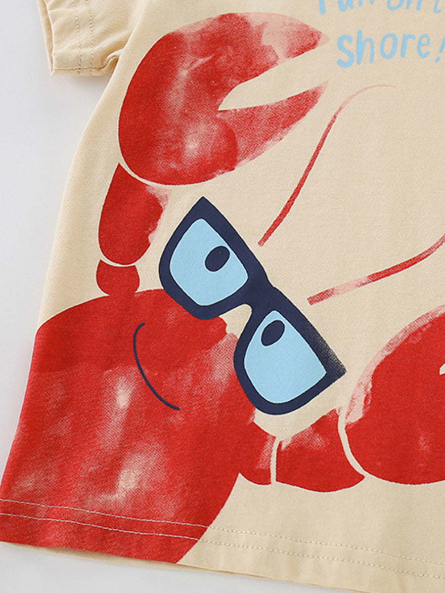 Beige cotton toddler tee with a playful red lobster graphic wearing blue sunglasses.