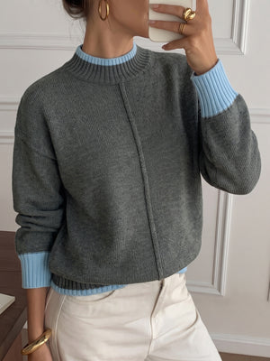 100% acrylic Care instructions: Machine wash cold crewneck sweater in light blue with relaxed silhouette