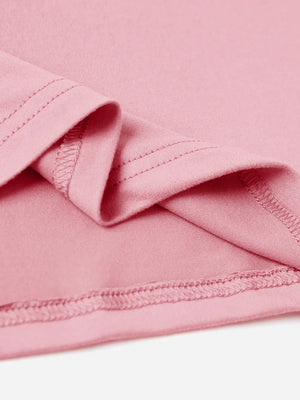 Dusty pink t-shirt detail showing hem and sleeve stitching