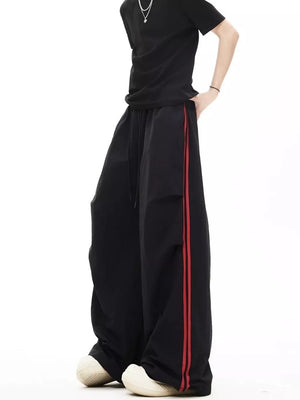 wide-leg pants in black featuring drawstring waist and wide-leg fit