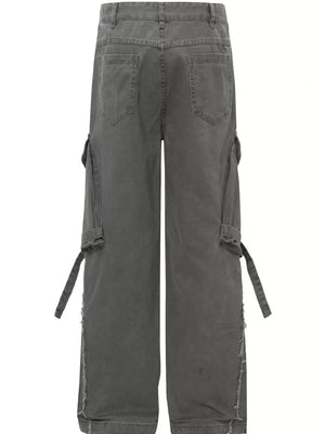 Grey cargo pants with buckle detail, pockets, and distressed hem.
