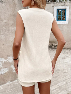 Textured tank top and shorts set in apricot with sleeveless design and crew neck.