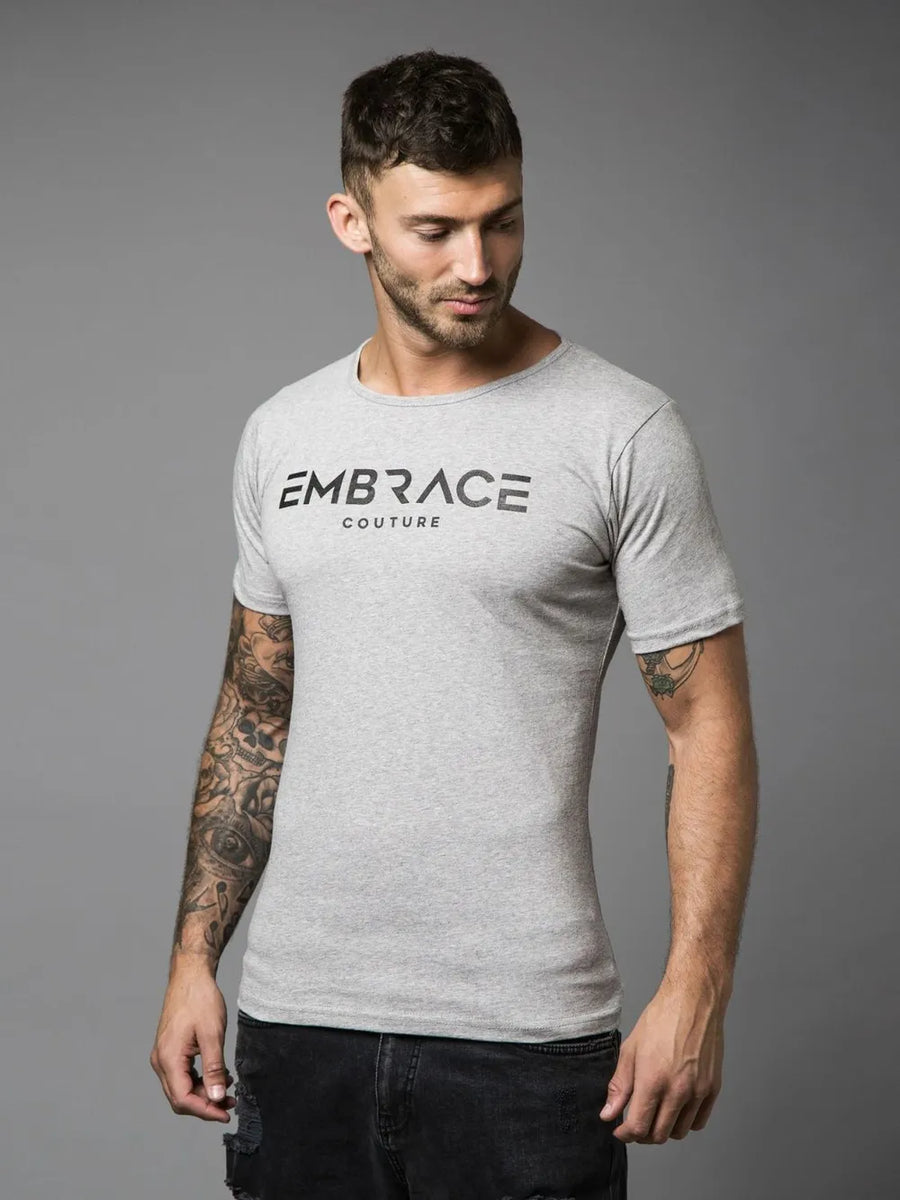 Gray t-shirt with black Embrace Couture logo, crew neck, short sleeves.