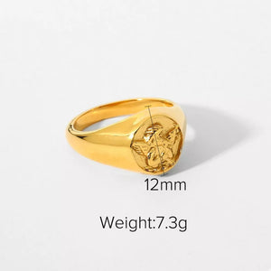 gold ring with embossed Cupid detail and not applicable