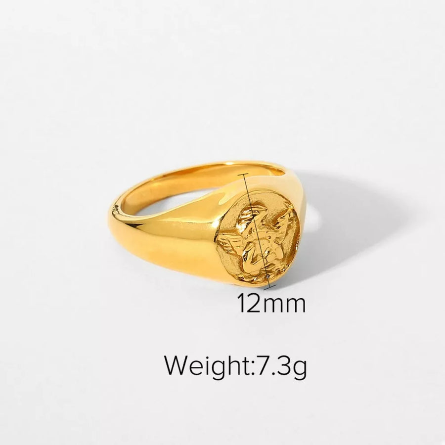 gold ring with embossed Cupid detail and not applicable