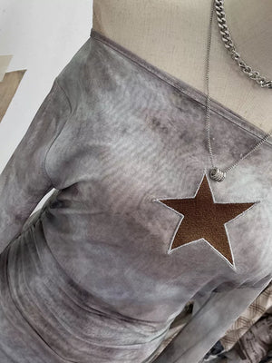 Asymmetrical maternity overshirt in taupe tie-dye with a brown star detail and ruched sides.