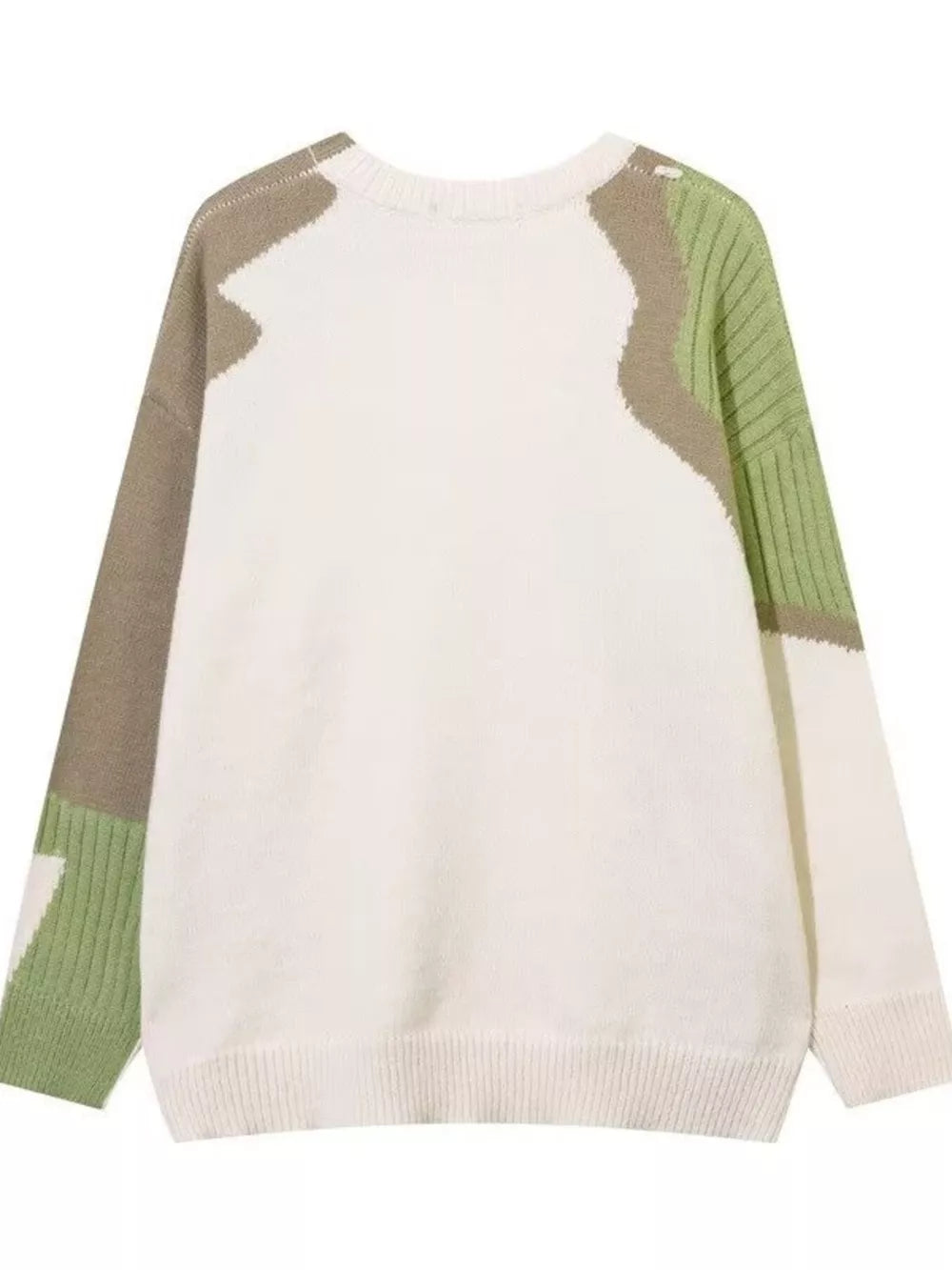Men's cream sweater with abstract green and tan color block details and textured sleeves.