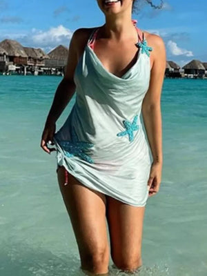 Light blue cowl neck halter mini dress with starfish embellishments