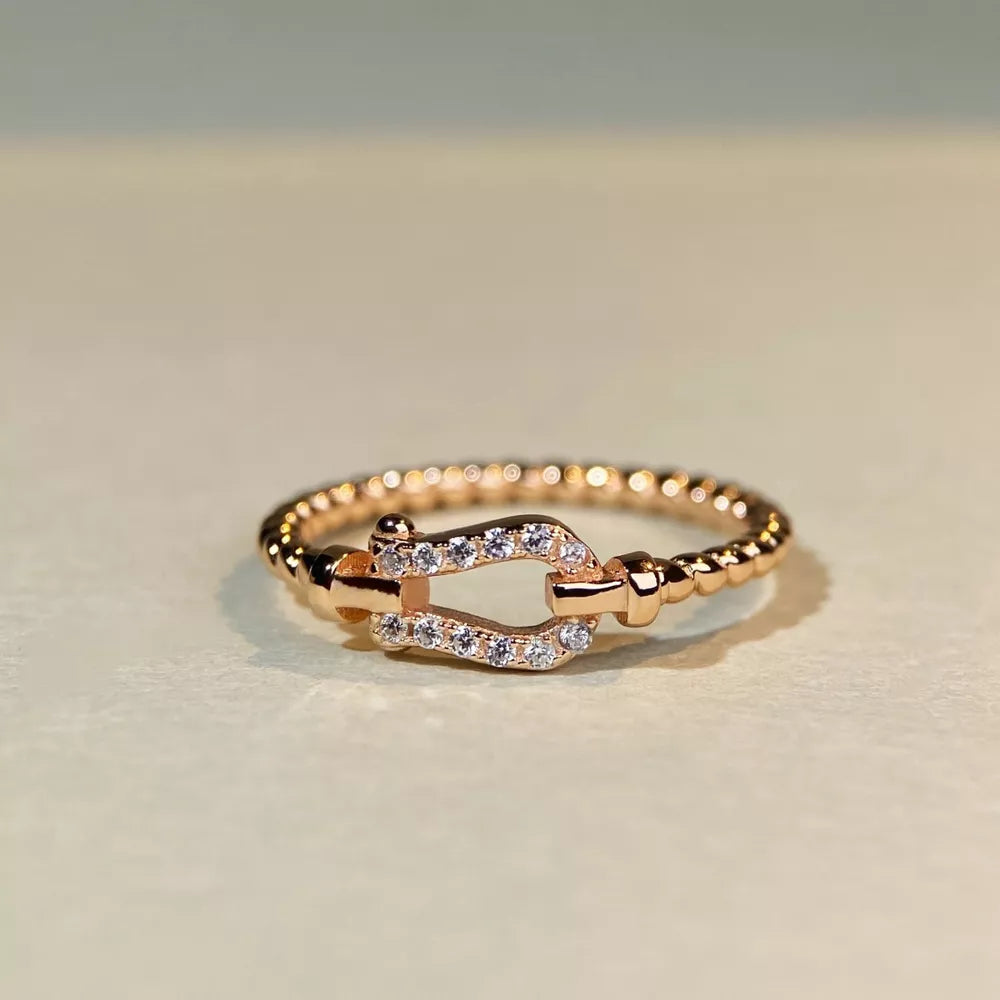 925 Sterling Silver Zircon Horseshoe Ring in Gold with zircon embellishment