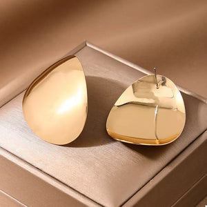 18K Gold-Plated, Alloy Care instructions: Avoid wearing during exercise, as swea earrings in gold with curved irregular