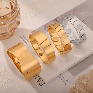Gold leaf bracelets in Style A and Style C, plus a silver bracelet.