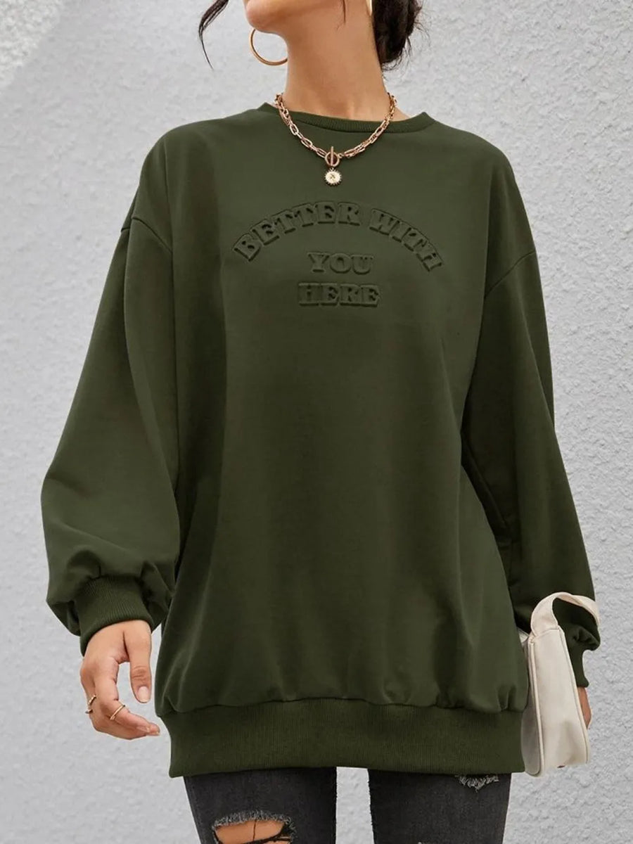 Embossed Sentiment Oversized Sweatshirt in Black Forest with crewneck and long sleeves.