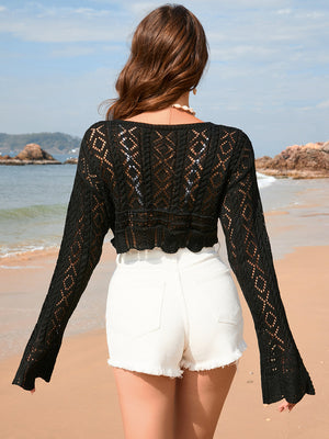 Black crochet tie-front beach shrug with diamond pattern and bell sleeves.