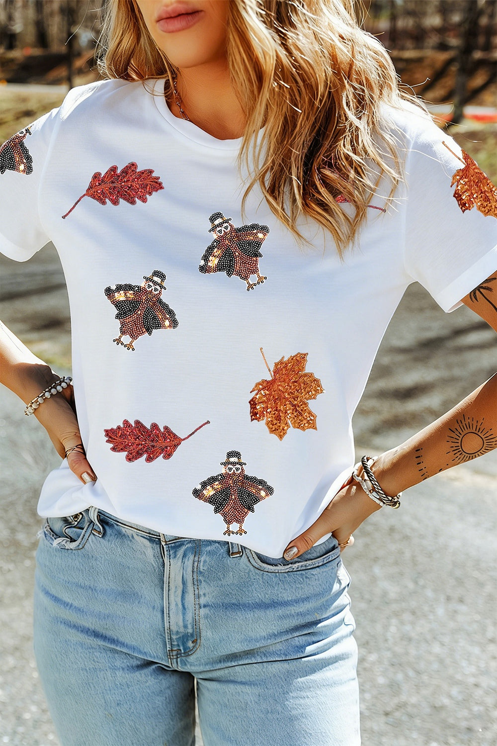 white t-shirt with graphic print and round neck