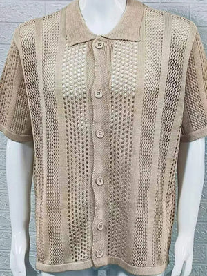 Beige open-knit resort shirt with short sleeves and button front.