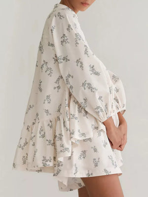 Cream floral print mini dress with ruffled hem and balloon sleeves