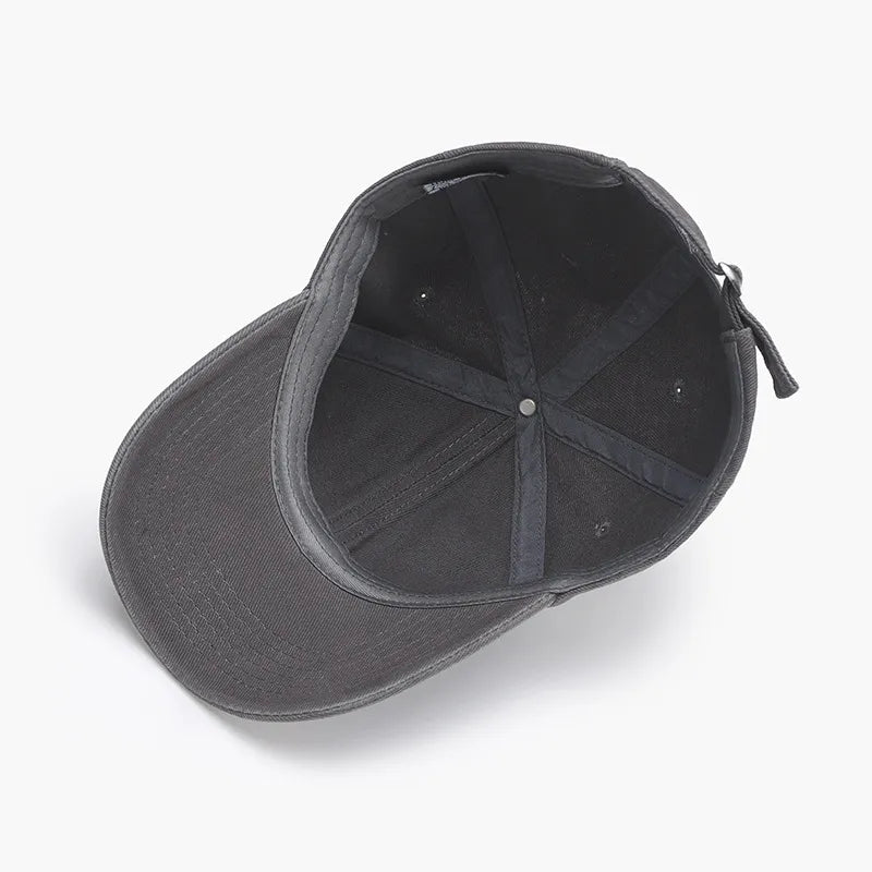 Distressed gray cotton baseball cap with adjustable strap and interior lining.
