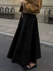 100% polyester Care instructions: Machine wash cold A-line skirt in Black with A-line silhouette