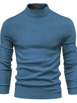 Dusty Blue ribbed mock neck sweater with sculpted shoulders and long sleeves.