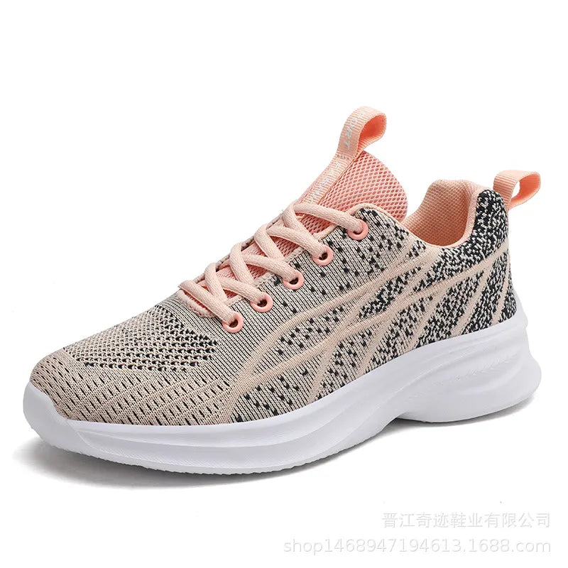 Pale Blush textured knit performance runners with white soles and pink laces.