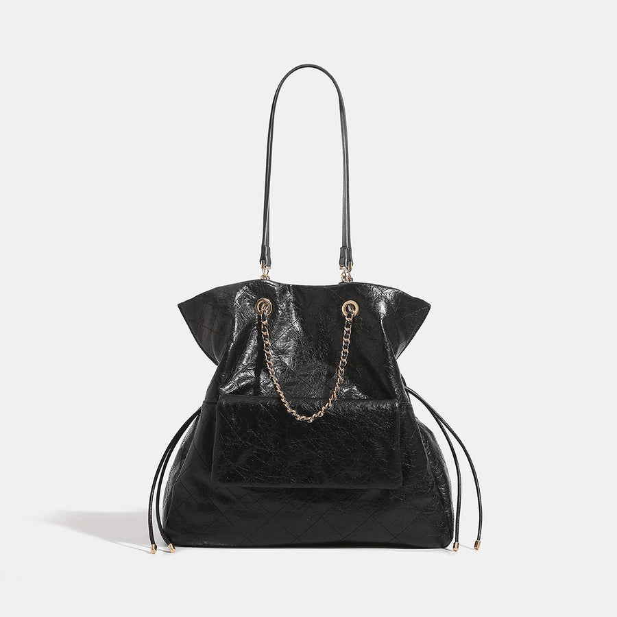 black backpack with drawstring and geometric