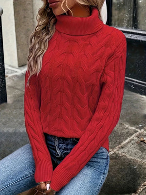 White turtleneck sweater featuring cable-knit and cable knit