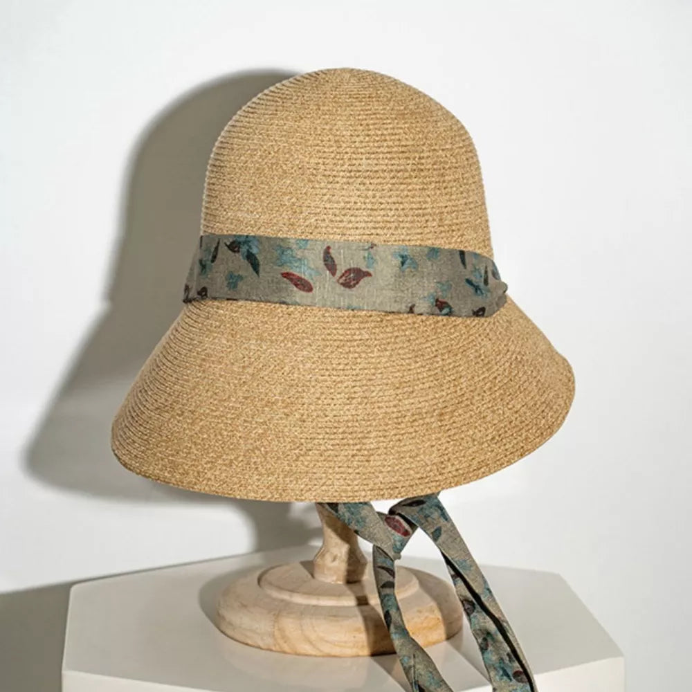 Straw sun hat with floral ribbon detail and defined crown