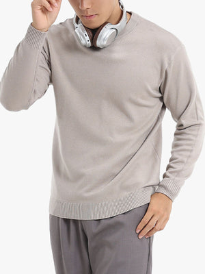 crewneck sweater in taupe featuring ribbed cuffs and regular fit
