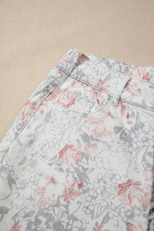 Floral print cotton jeans with a wide-leg cut and a cropped length.