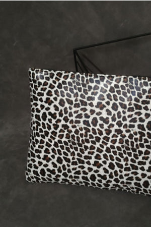 Leopard print zip-top clutch bag with bold animal print pattern.