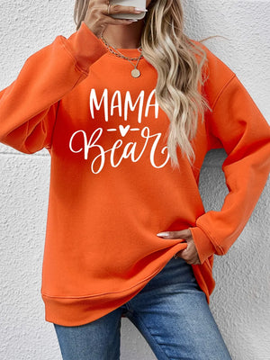Orange Mama Bear graphic sweatshirt with crew neck and long sleeves.