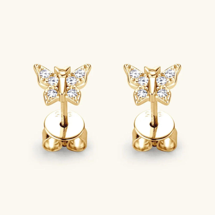 Gold moissanite butterfly stud earrings with clear stones.