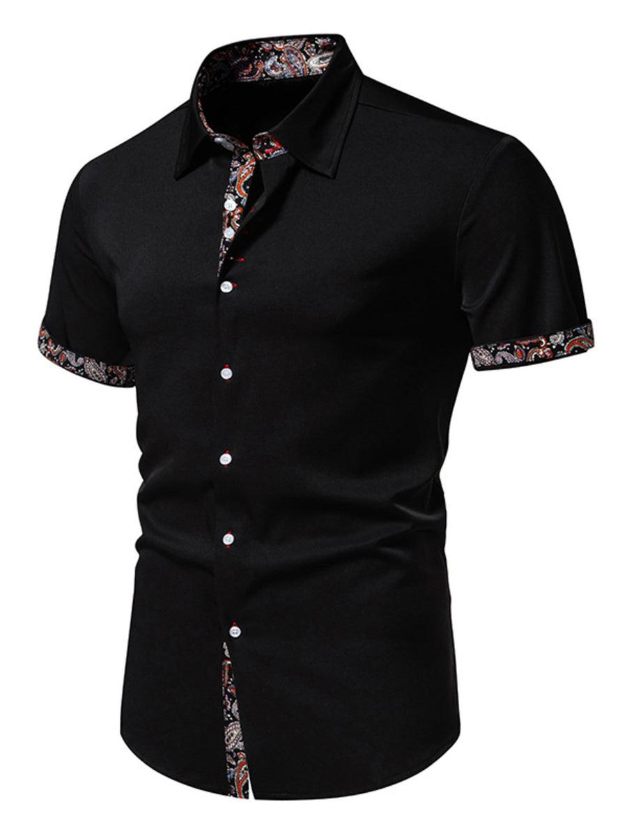 Black short sleeve buttoned shirt with paisley trim on collar, cuffs and hem