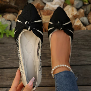 beige flats featuring pointed toe and speckled