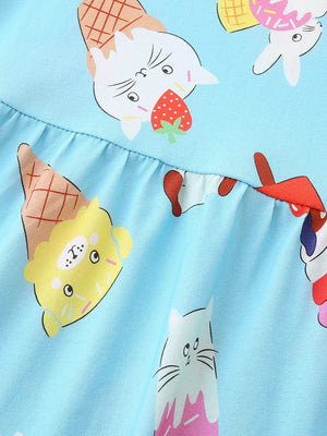 Baby dress with blue cotton blend fabric and whimsical ice cream cat print.