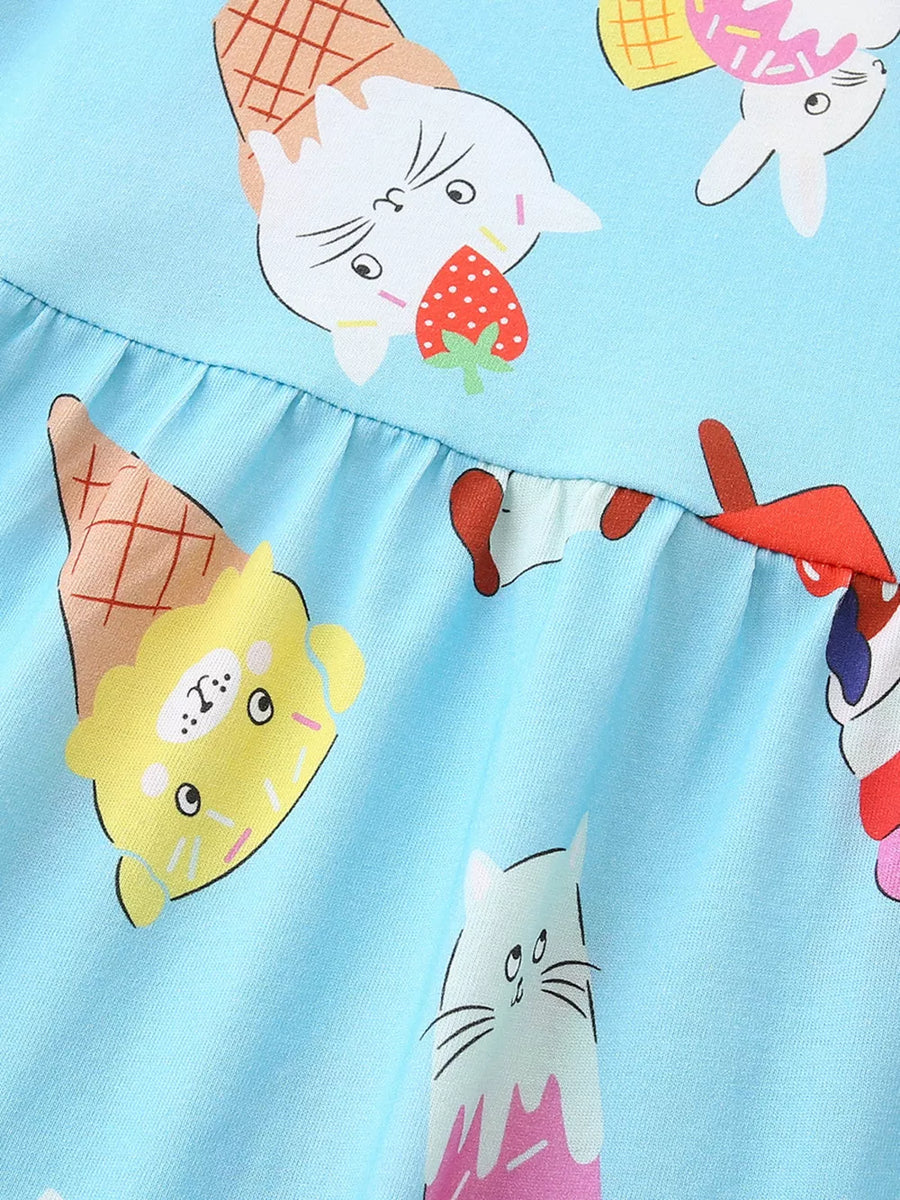 Baby dress with blue cotton blend fabric and whimsical ice cream cat print.