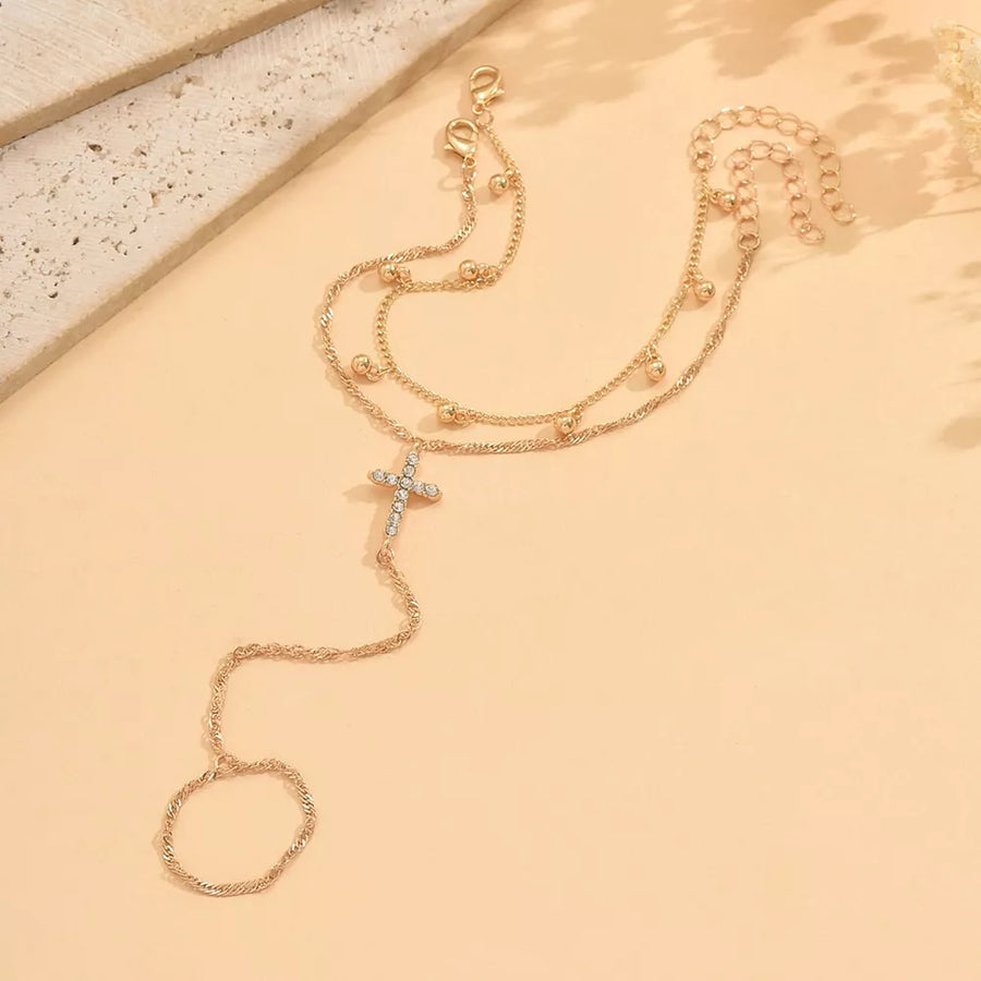 Gold bracelet with rhinestone embellishment and not applicable